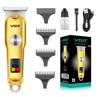 محتویات کامل جعبه ماشین اصلاح VGR V-290 شامل دستگاه، شانههای راهنما، روغن و کابل شارژ در بازرگانی محمدی قشم